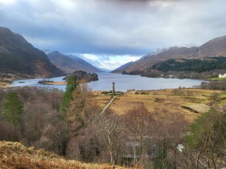 Monument, mountains and loch