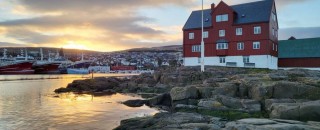 Torshavn, coastal town in sunset.