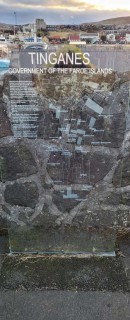 Glass sign with information about the government of the Faroe Islands.