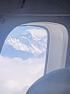 Everest through a plane window.