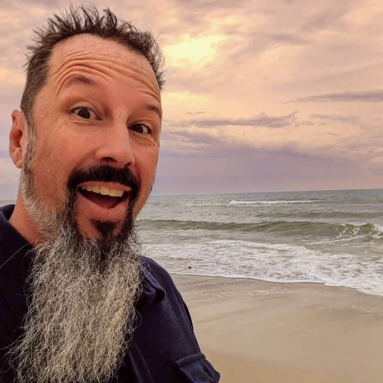 Travel writer Michael C. Upton on the beach at St. George's Island, Florida, named the best beach in the United States